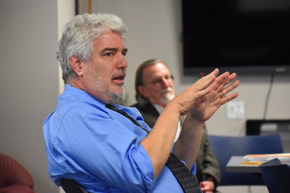 "Bill Pamerleau, philosophy professor, and Frank Wilson, sociology professor, co-teaching a Greensburg honors class."