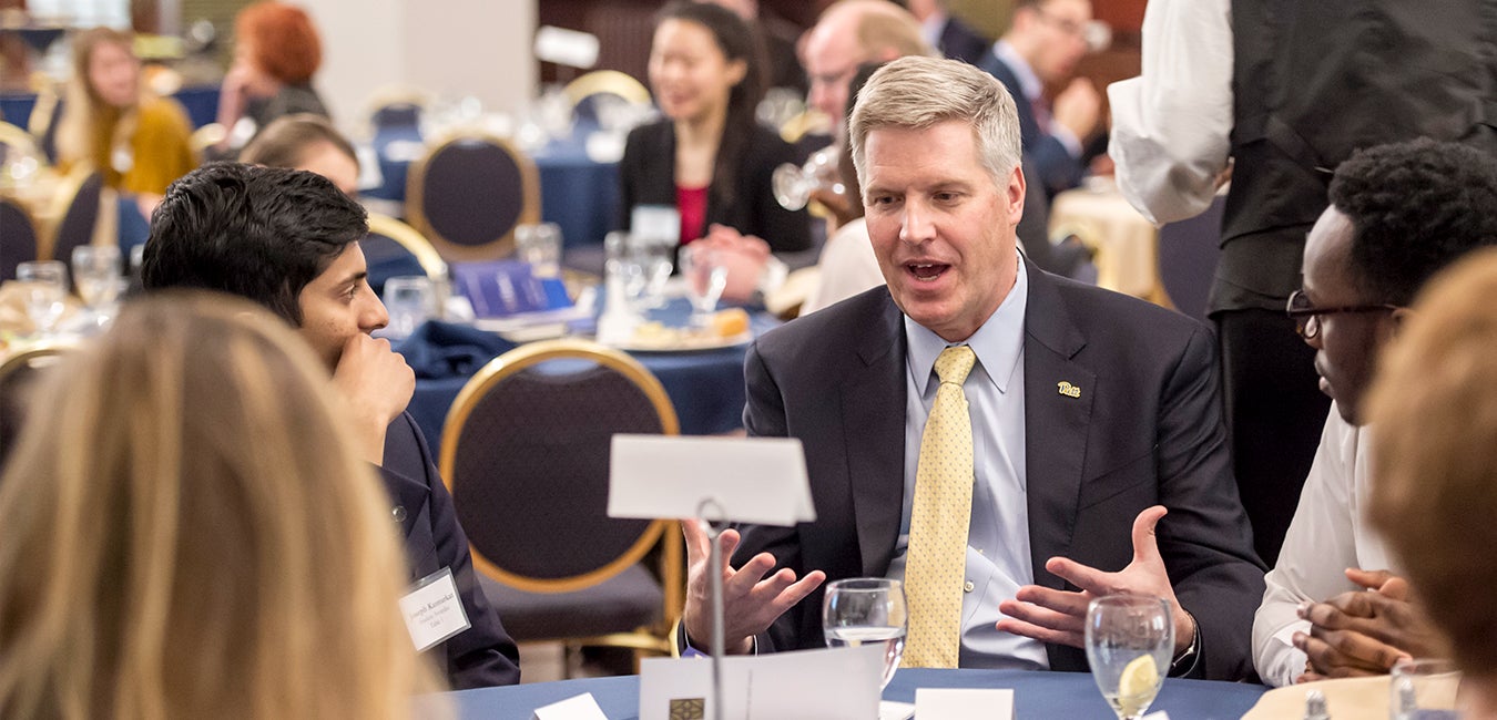 Chancellor Gallagher speaking to a group of students