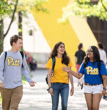 Students walking on campus.