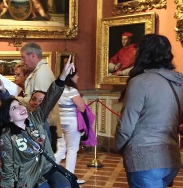 Person pointing in a museum