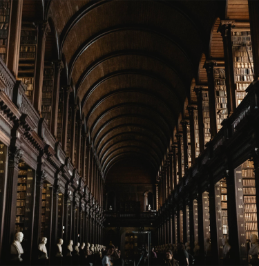 Dark hall with head statues