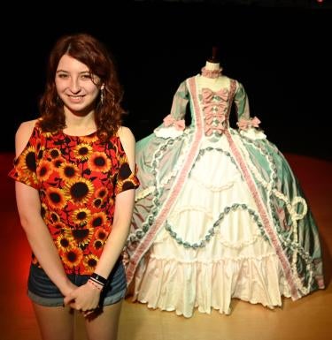 Maya Jones with Versailles court gown she created for her Creative Arts Fellowship project.