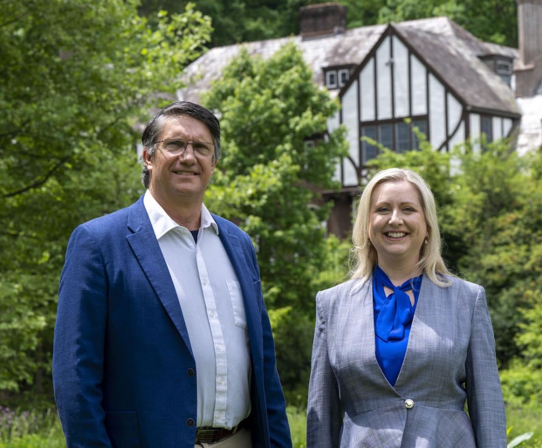 Pitt-Greensburg president Robert Gregerson and FHC dean Nicola Foote stand outside Lynch Hall on Greensburg's campus.